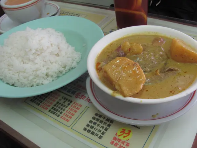 咖哩雜扒飯的餸及飯是分上的