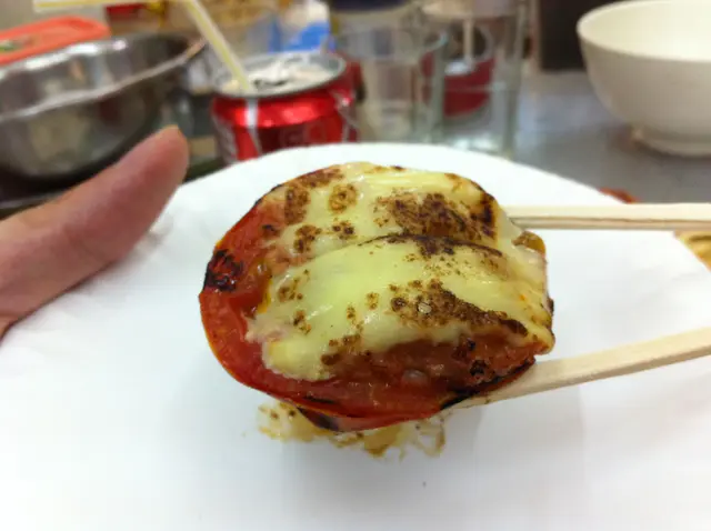 個蕃茄佢加左少少肉碎... 燒到個芝士熔落d肉碎同蕃茄度... 正!~