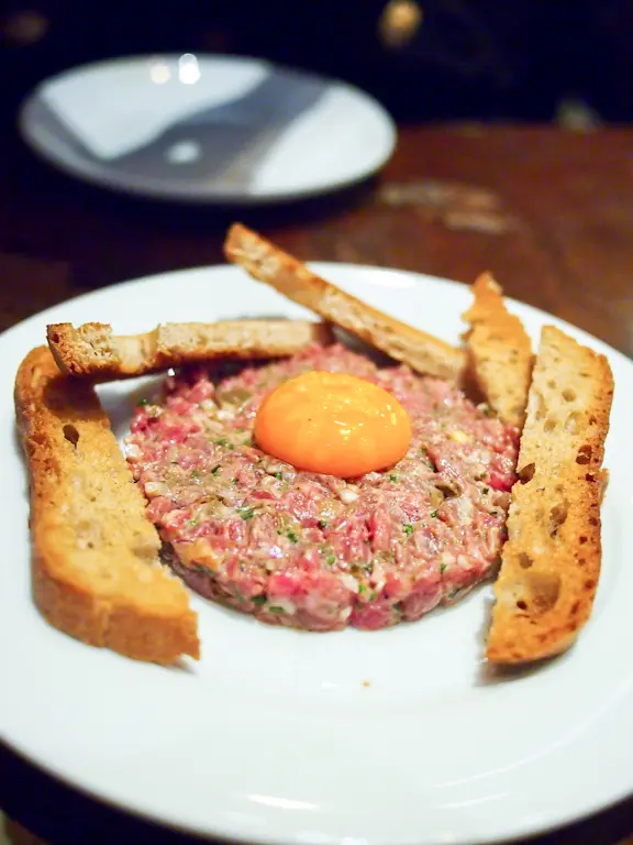 steak tartar with egg yolk – $110