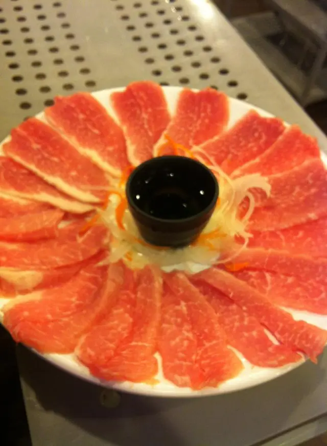 似用肉眼筋片出黎扮黑豚肉