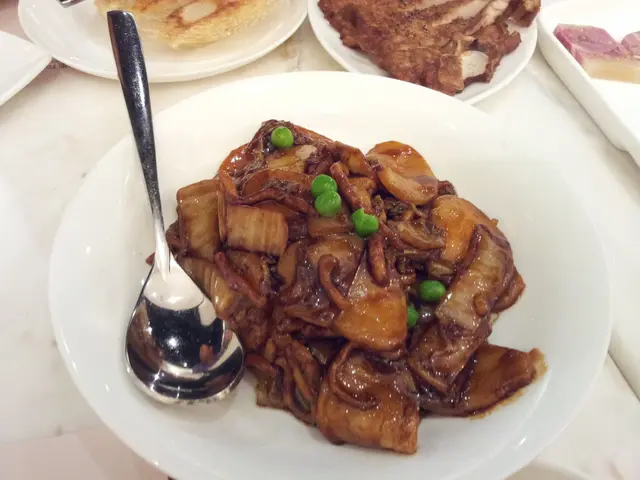 大白菜肉絲炒年糕 $58