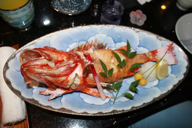 聽講E 條魚係日本人過節先食...炸得好靚,好考功夫‧