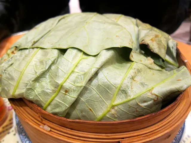 大蝦蒜香荷葉籠仔飯 Steamed special fried rice with dry braised prawns ($160)