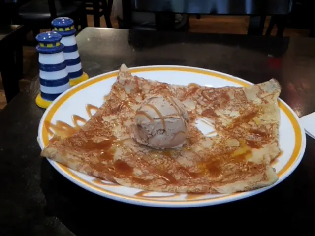Sweet crepe with caremel sauce and caramel ice-cream