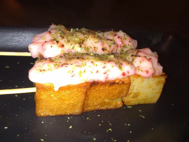 bite sized fish cake topped with lobster mayo
