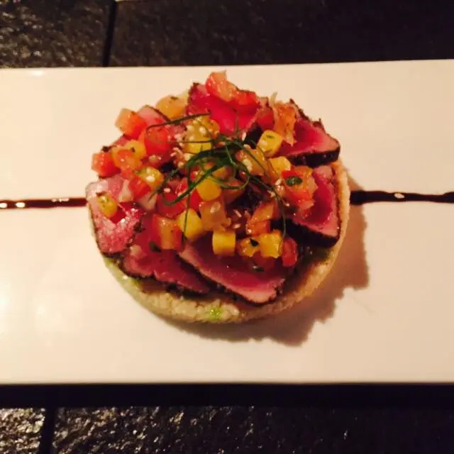 Five peppercorn blackened tuna with mango salsa & cucumber couscous