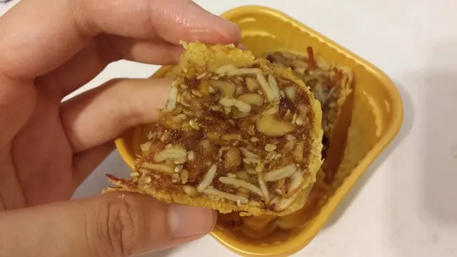 完全堆滿伍仁,填充整個畫面的不是粉漿,拿上手也不太油膩又不易鬆散