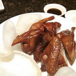 Deep Fried Young Pigeon, with prawn crackers