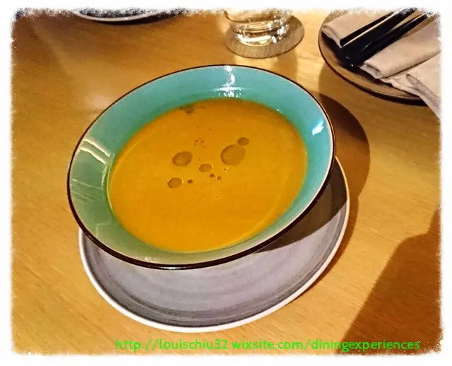 Prawn Bisque with seafood agnolotti (Lime leaf oil)