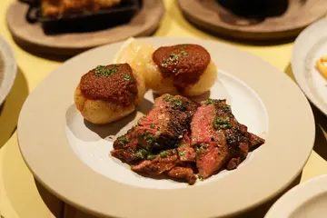 Skirt steak, papas brava, chimichurri