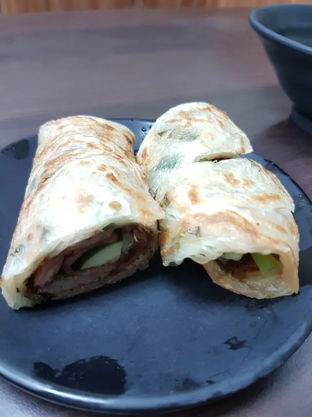 有啲似片皮鴨
入面係牛展