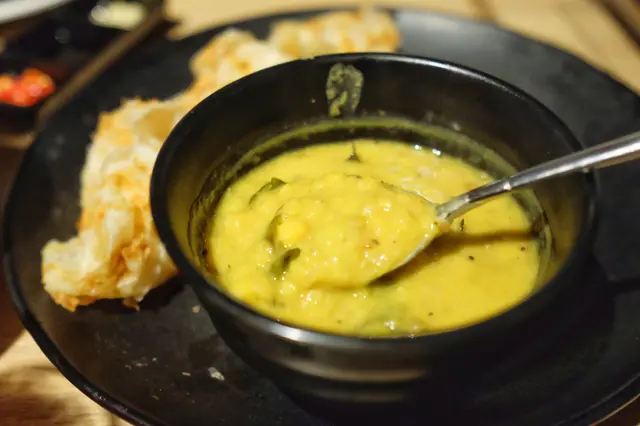 Roti canai with dal curry