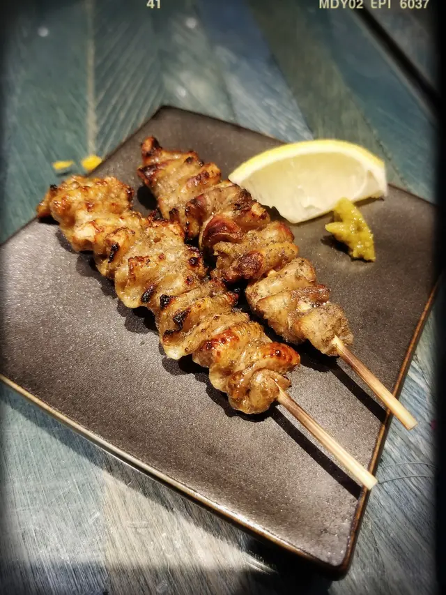 串燒雞皮（$35/串）