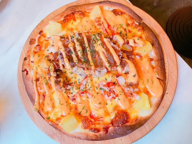 點解個個都叫軟殼蟹比薩架？