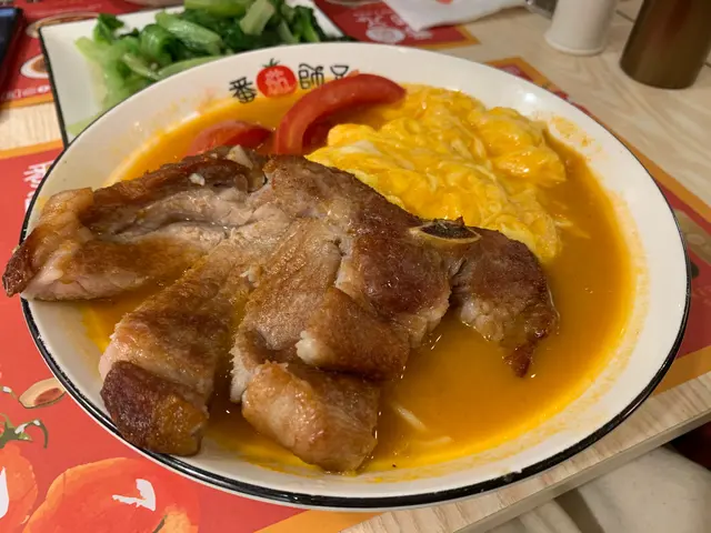 厚切豬扒番茄濃湯麵加滑蛋