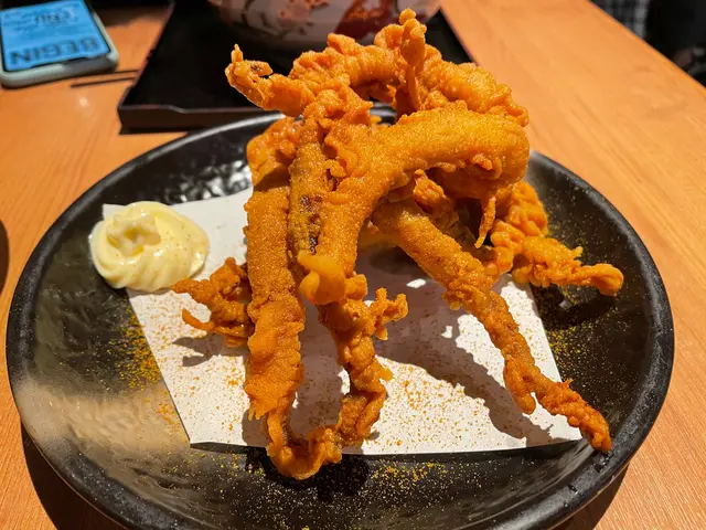 啲粉佔咗九成，魷魚鬚炸到非常之乾