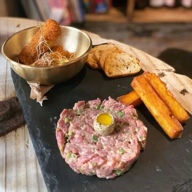 with Braised lamb breast fritters and polenta fries 