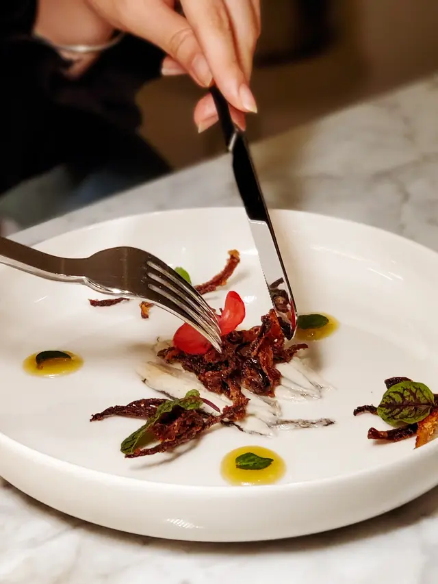 Mediterranean Anchovies in Sour Sauce “Carpione”, Crunchy Red Onions, Sicilian Organic Honey Emulsion