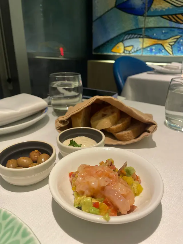 House marinated olives and rustic bread   +  Gambas Rosa tartare with pepper and citrus   +  Chicken pate with truffle oil