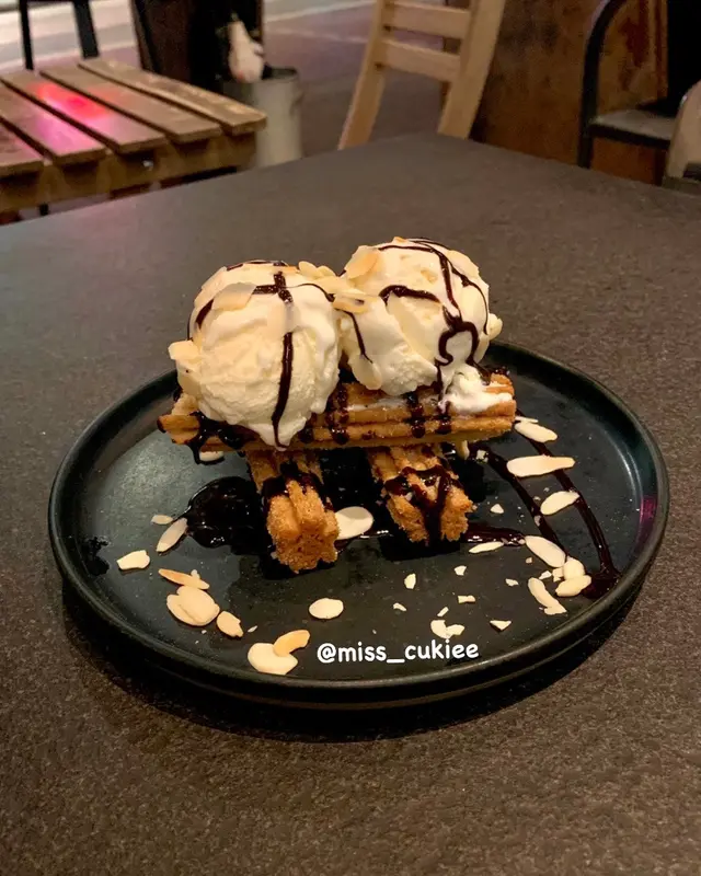 Devil Churros in Chocolate Sauce with Vanilla Ice-Cream