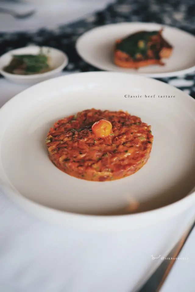 以$100加配牛肉他他