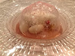 Peach compote topped with peach resin crystal