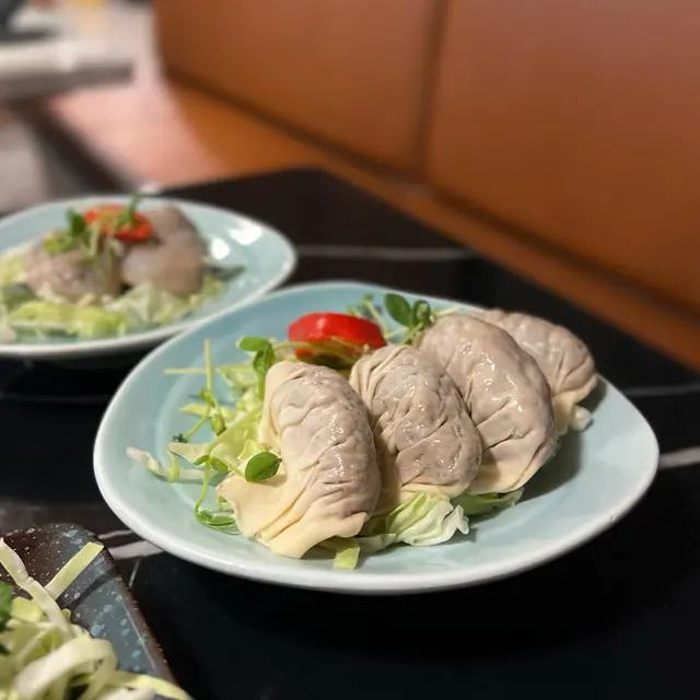  麻辣牛肉餃 （半份） $68