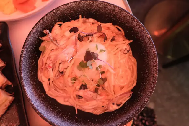 Smoked Salmon and Mushroom Spaghetti with Cream Sauce and Onsen-egg