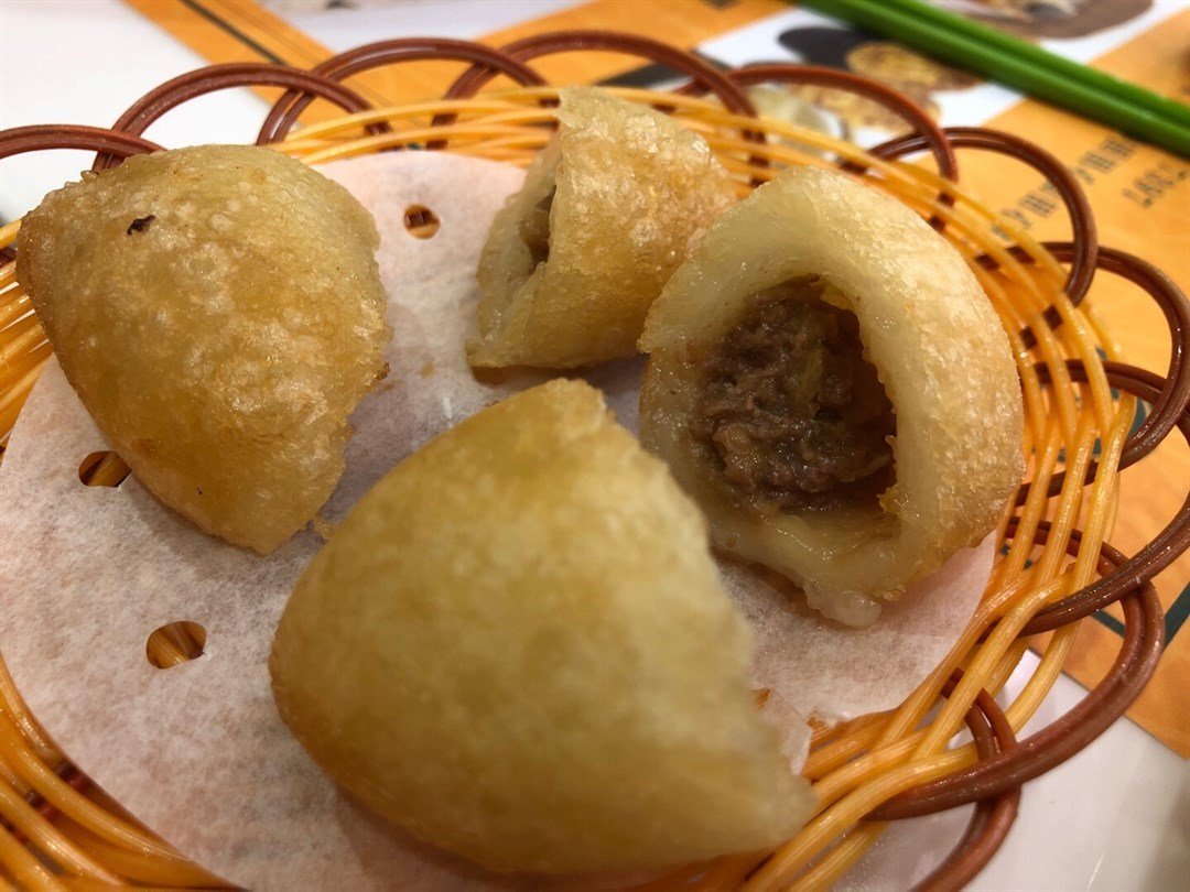Hom Sui Gok (鹹水角) - Savory deep-fried sticky rice dumpling with minced pork filling