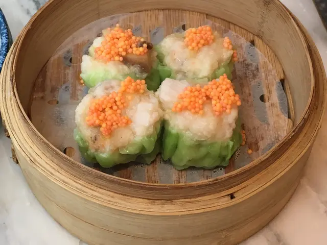Shrimp  &  pork  dumplings  w/  crab  roe