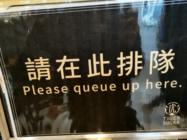 Find the sign for the correct queue