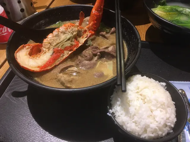 真豬求其龍蝦湯泡飯