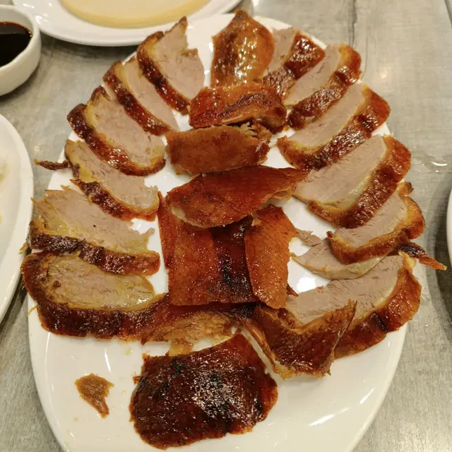 北京填鴨（半隻)（跟一份摩摩皮約20塊)