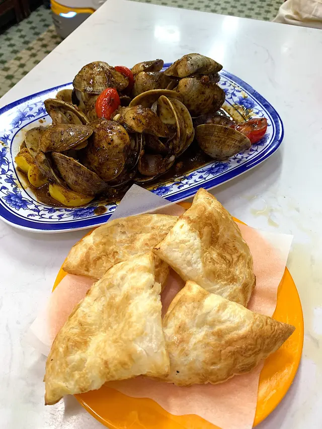 黑椒炒蜆配薄餅