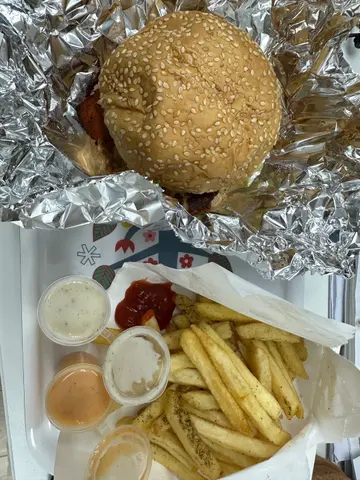 Single layered Chicken  Tikka  Burger with  fries
