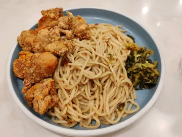 Crispy popcorn chicken with scallions sauce noodles