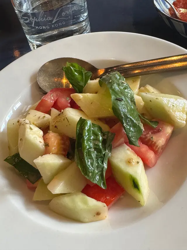 Tomato & cucumber salad in oregano dressing