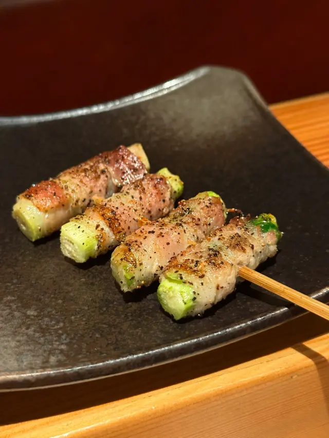 Asparagus  wrapped  with  pork