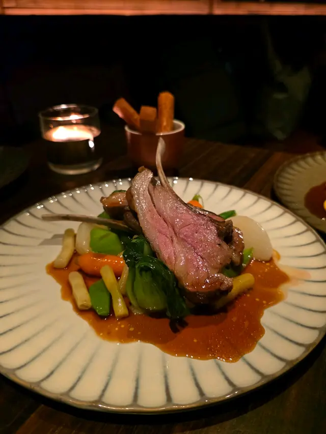 Garlic, Thyme & Rosemary Oven Roasted Lamb Rack with Extra Virgin Olive Oil, Seasonal Green Vegetables & Panisse (+$198)