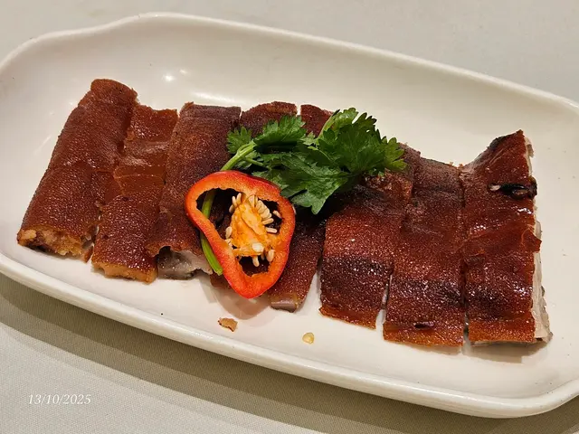 乳豬，加一蚊有四份一隻